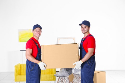 Trained moving staff using protective equipment during a Farringdon move