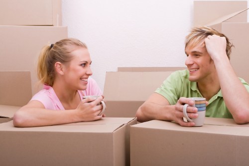 Team handling furniture removal in a central London street