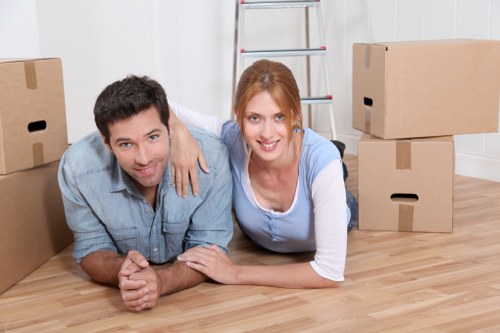 Home moving boxes and furniture prepared for removals van transport