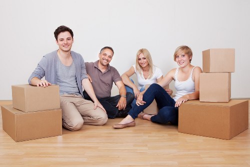 Professional movers transporting household items in Farringdon